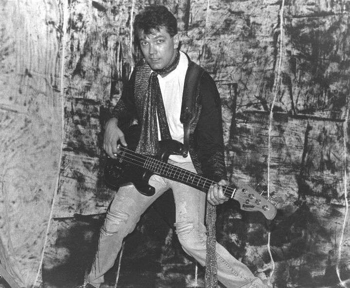 Chris Grimmett playing bass guitar